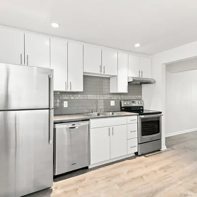 All-electric kitchen with stainless steel appliances at Lime Apartments